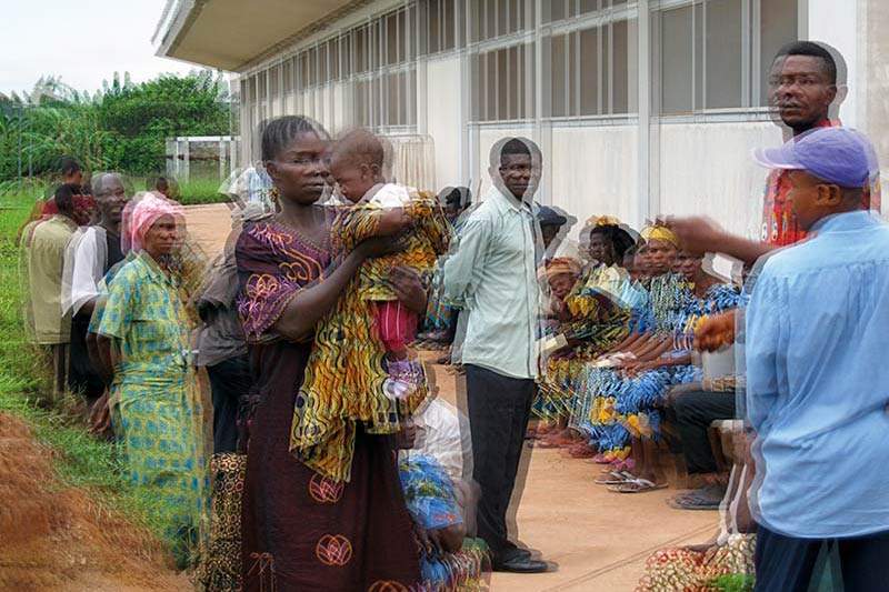 Blurry picture of people at the clinic - seen by someone with double vision